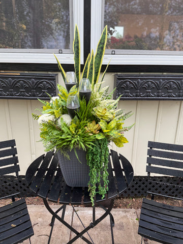 Yellow succulent drop in planter