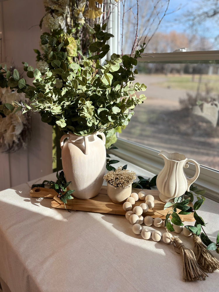 Faux eucalyptus vase arrangement