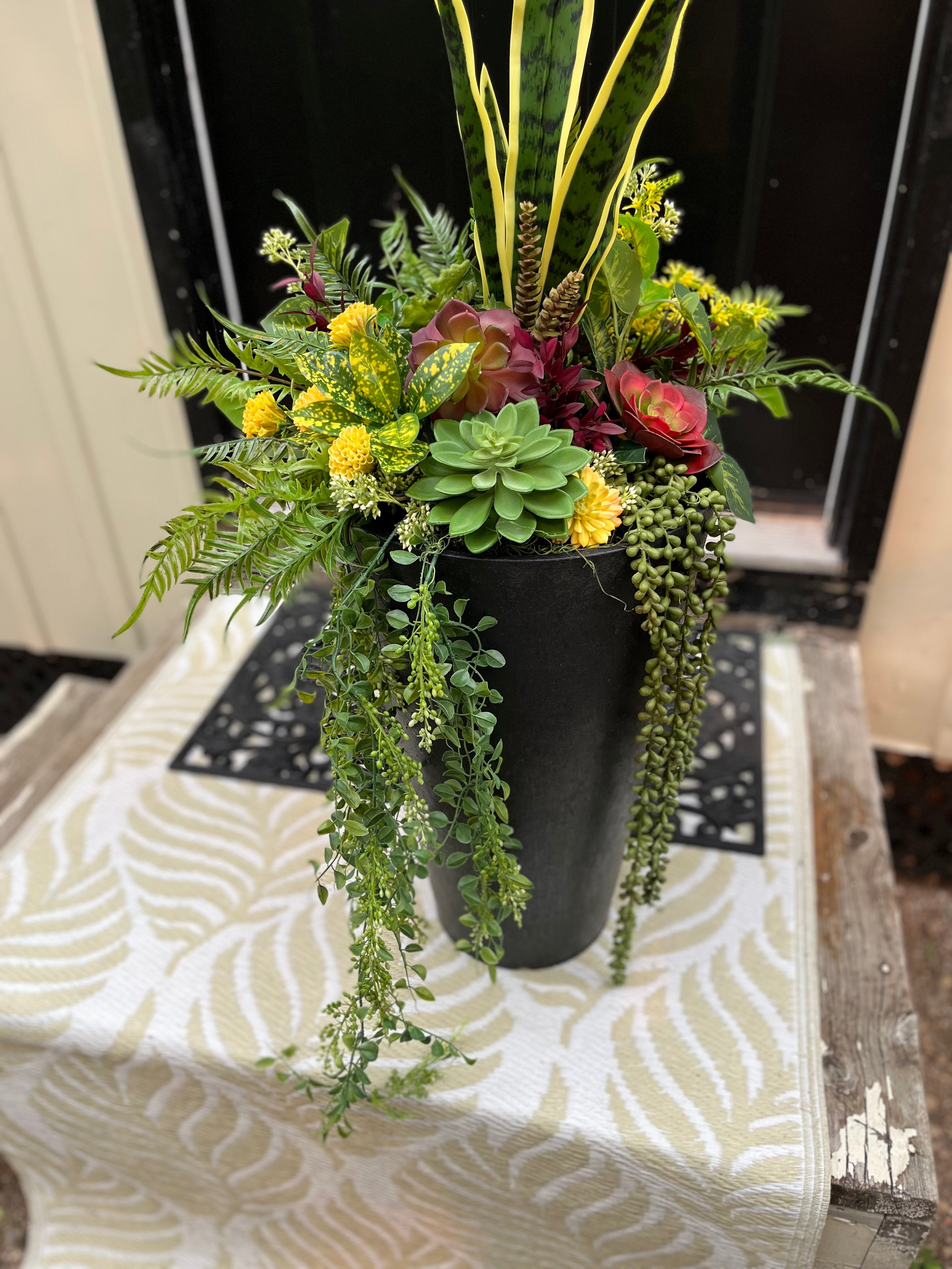 Vibrant succulent drop in planter