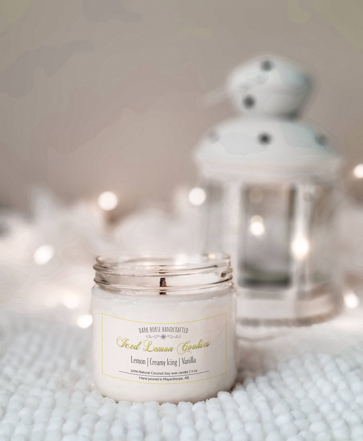 Iced Lemon Cookies soy candle in a cozy white scene with twinkle lights